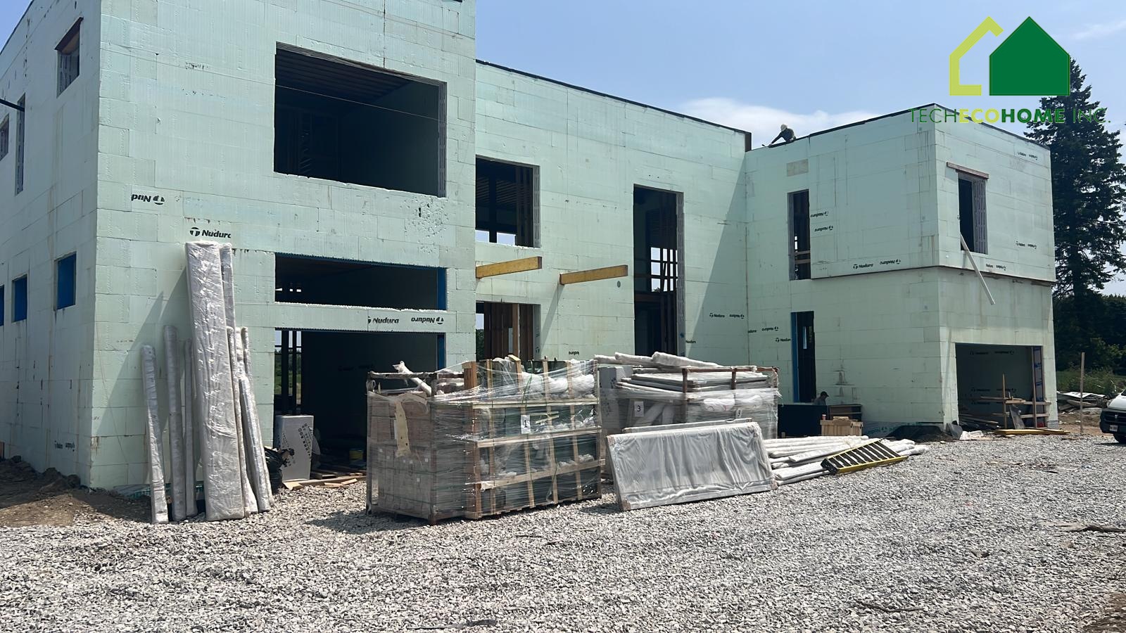 Two-storey ICF house exterior walls with formed window and door openings
