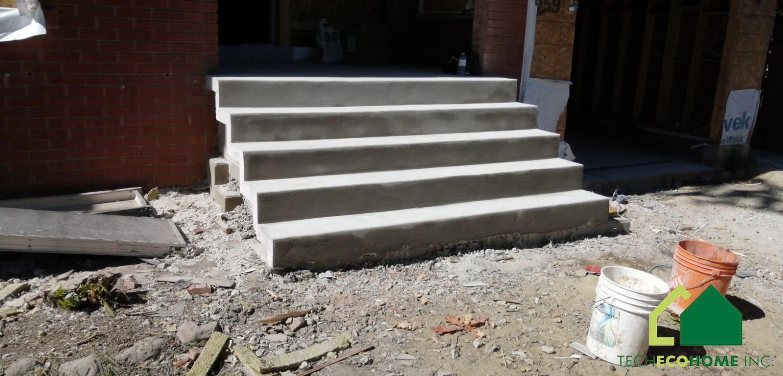 Concrete stair flight with finished treads and risers